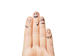 Image showing close up of hands and fingers with smiley faces