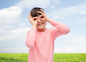 Image showing happy little girl making faces and having fun