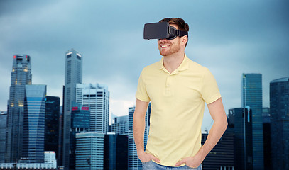 Image showing happy man in virtual reality headset or 3d glasses