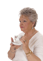 Image showing Senior woman drinking coffee.