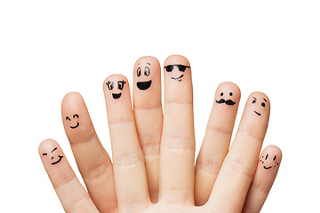 Image showing close up of hands and fingers with smiley faces