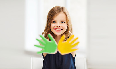 Image showing girl showing painted hands