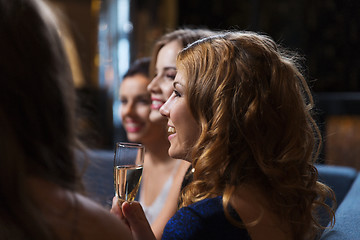 Image showing happy women with champagne glasses at night club