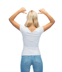Image showing rear view of young woman in blank white t-shirt