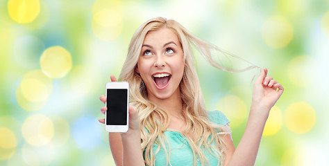 Image showing happy young woman or teenage girl with smartphone