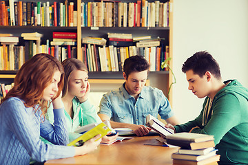 Image showing students with books preparing to exam in library