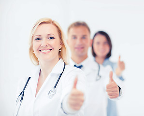 Image showing team of doctors showing thumbs up