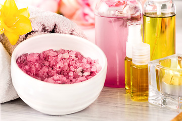 Image showing Spa setting with pink roses and aroma oil, vintage style 