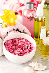 Image showing Spa setting with pink roses and aroma oil, vintage style 