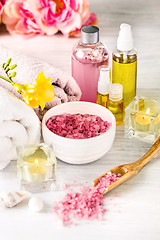 Image showing Spa setting with pink roses and aroma oil, vintage style 