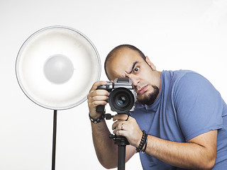 Image showing professional photographer with photographic equipment