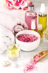 Image showing Spa setting with pink roses and aroma oil, vintage style 