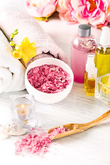 Image showing Spa setting with pink roses and aroma oil, vintage style 