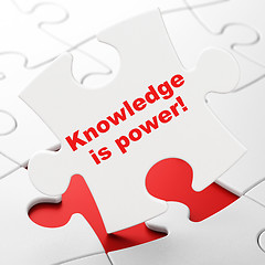 Image showing Learning concept: Knowledge Is power! on puzzle background