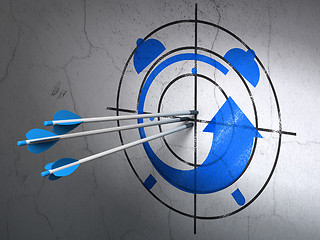 Image showing Timeline concept: arrows in Alarm Clock target on wall background