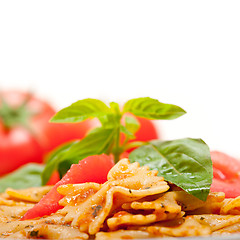 Image showing Italian pasta farfalle butterfly bow-tie and tomato sauce