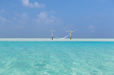 Image showing hammock in water on maldives beach