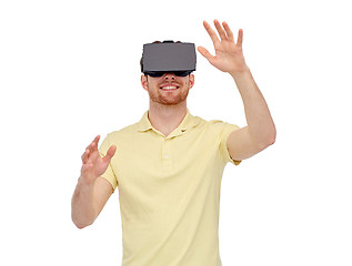 Image showing happy man in virtual reality headset or 3d glasses