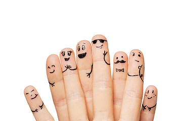 Image showing close up of hands and fingers with smiley faces