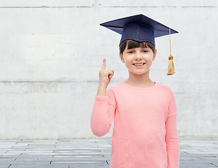 Image showing happy girl in bachelor hat or mortarboard