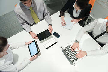 Image showing aerial view of business people group brainstorming on meeting