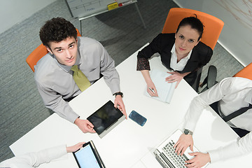 Image showing aerial view of business people group brainstorming on meeting