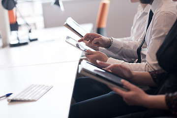 Image showing business people on meeting  using tablet