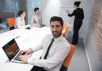 Image showing young business man at meeting