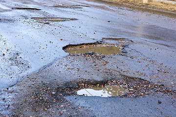 Image showing Pits on bad road