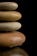 Image showing balancing zen stones on black