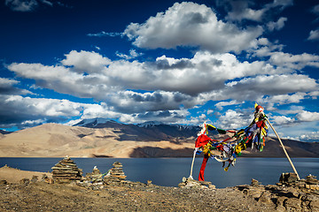 Image showing Buddhist prayer flags lungta at Himalayan lake