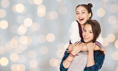 Image showing happy smiling pretty teenage girls hugging