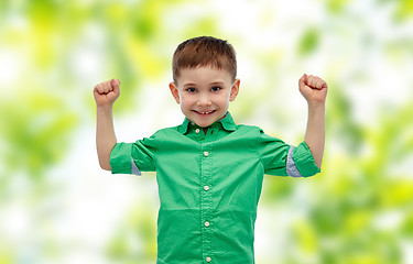 Image showing happy smiling little boy with raised hand