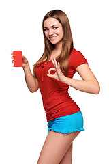 Image showing smiling teen girl holding blank credit card