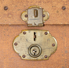 Image showing Old canvas trunk lock close up