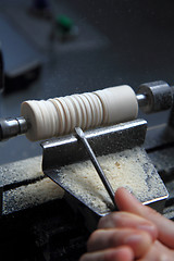 Image showing small wood-turning lathe