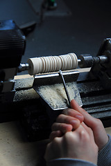 Image showing small wood-turning lathe