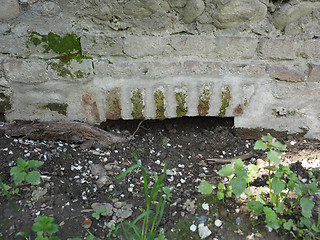 Image showing Arch in a wall for irrigation