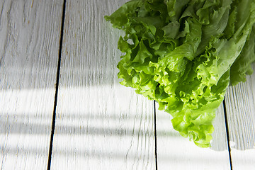 Image showing lettuce salad on a wood