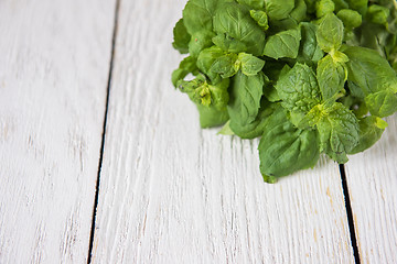 Image showing Fresh peppermint on wood 