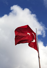 Image showing Turkish flag and blue sky with clouds