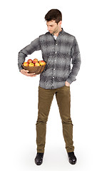 Image showing Healthy man with bowl full of apples