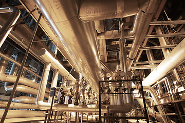 Image showing Equipment, cables and piping as found inside of a modern industr