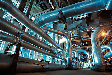 Image showing Equipment, cables and piping as found inside of a modern industr