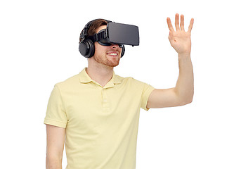 Image showing happy man in virtual reality headset or 3d glasses