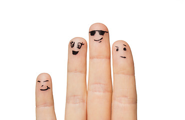 Image showing close up of hands and fingers with smiley faces