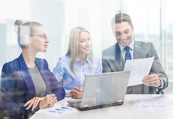 Image showing business team with laptop having discussion