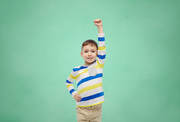 Image showing happy smiling little boy with raised hand