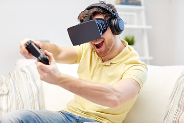 Image showing man in virtual reality headset with controller