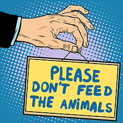Image showing Hand sign please dont feed the animals